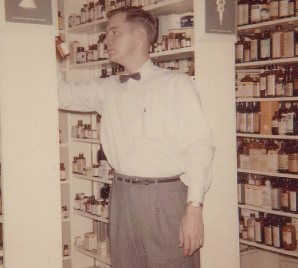 Clayton McWhorter working in a pharmacy