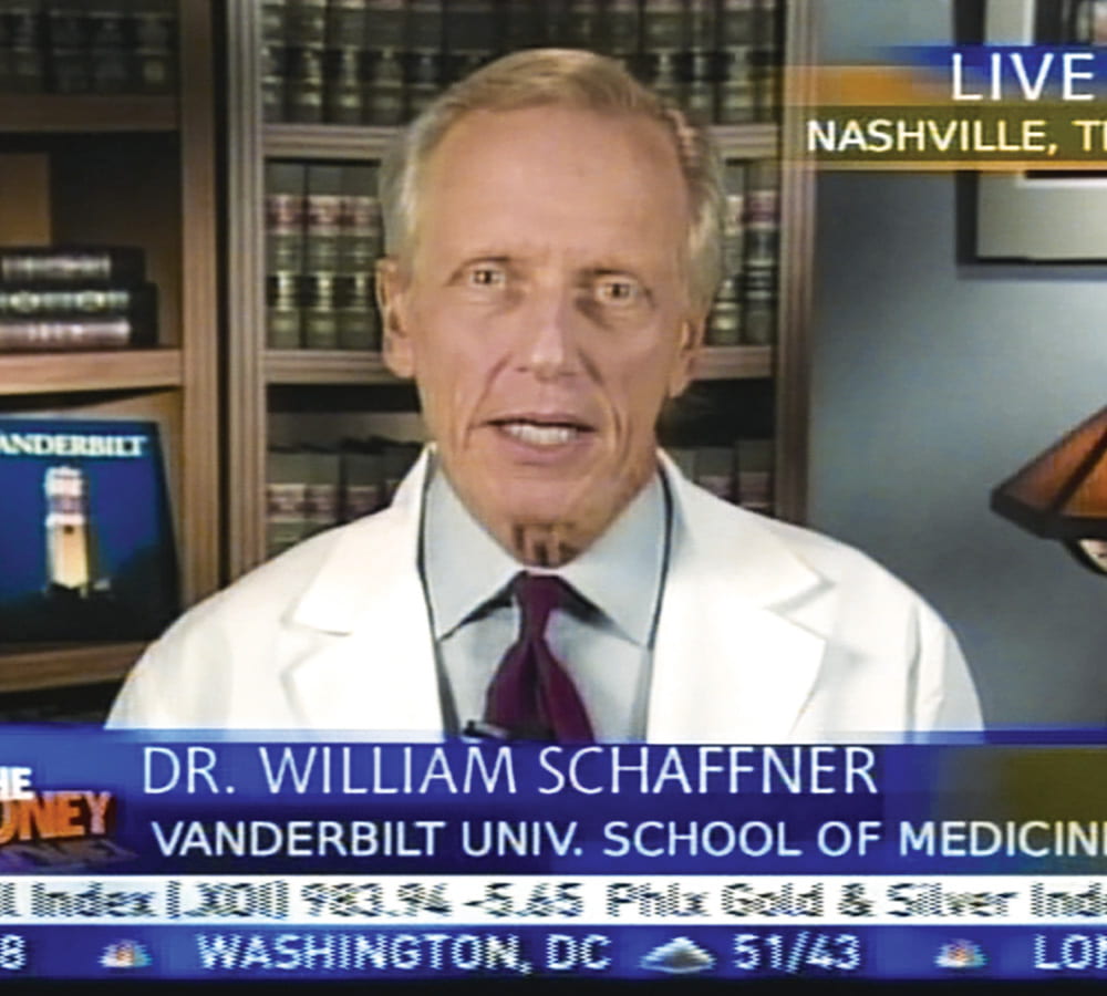 A screenshot of William Schaffner talking on television